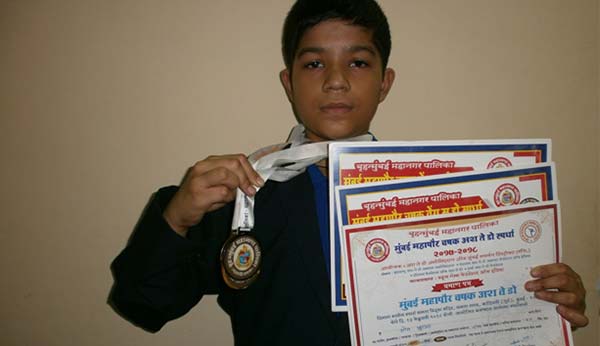Mst. Aum Pawan Khurana gets a Gold medal in Karate - Ryan International School, Kandivali East